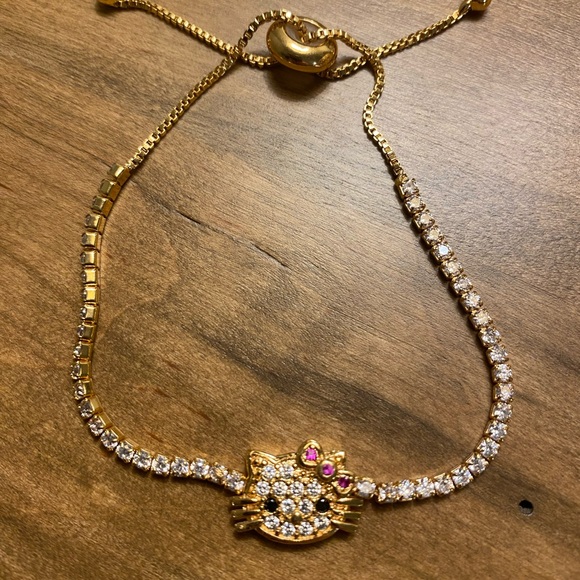 Hello Kitty Jewelry - Hello Kitty Elegant Gold Inspired Bracelet with Pink Gem Accents